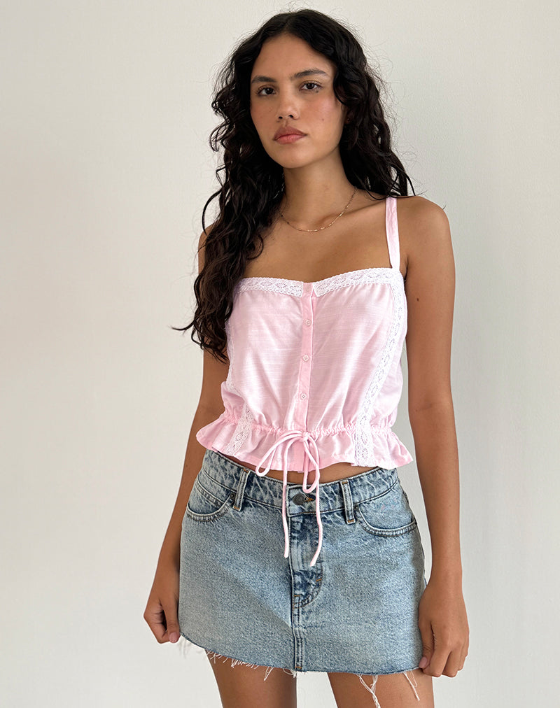 Top Zaria con laccetti in rosa chiaro e finiture bianche