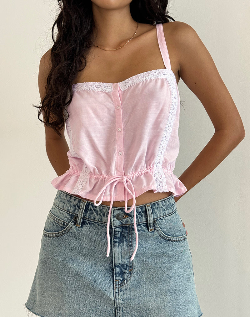 Top Zaria con laccetti in rosa chiaro e finiture bianche