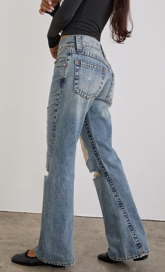 Strappato a vita bassa con cuciture ritorte