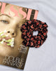 Immagine di Scrunchie in fiore d'autunno