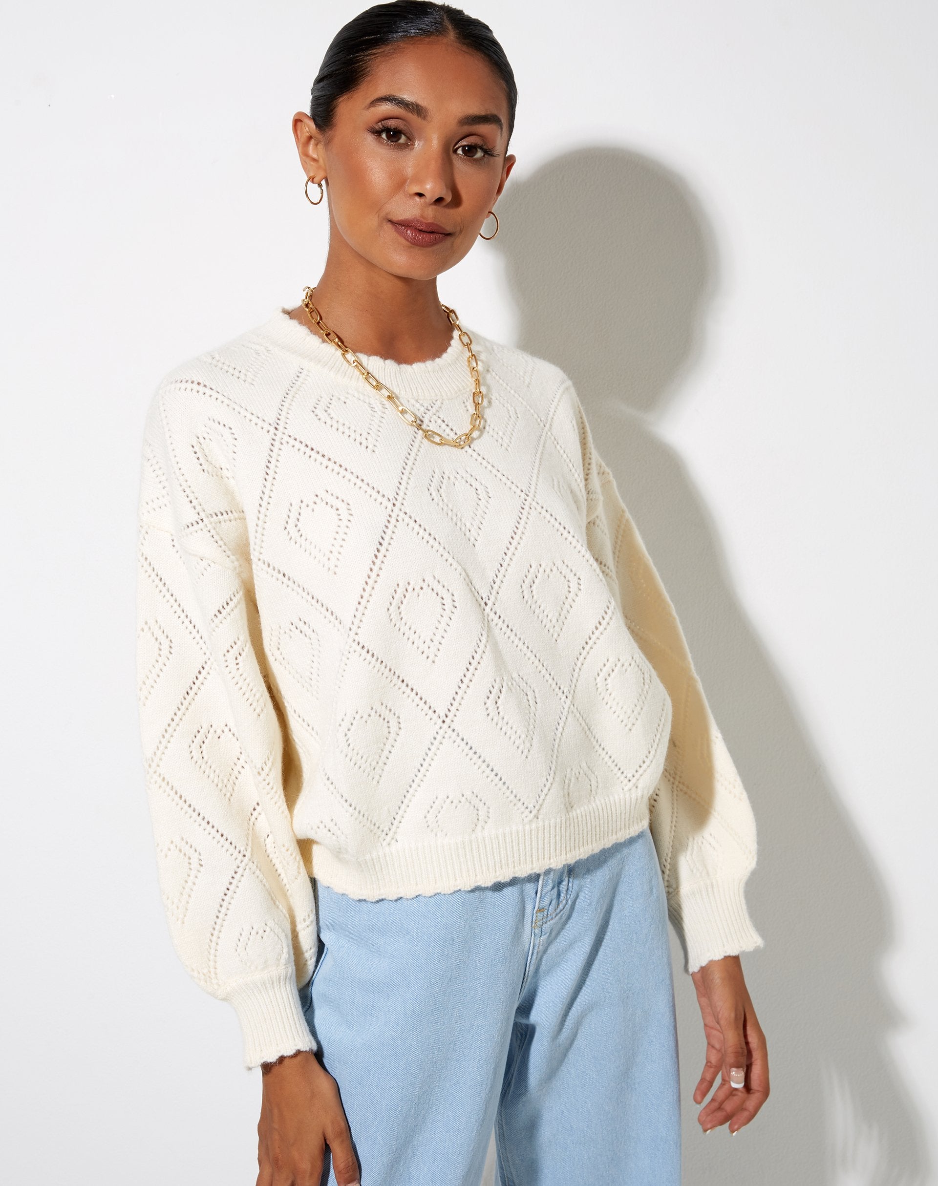 Immagine di Ammar Jumper in crema con diamante e cuore