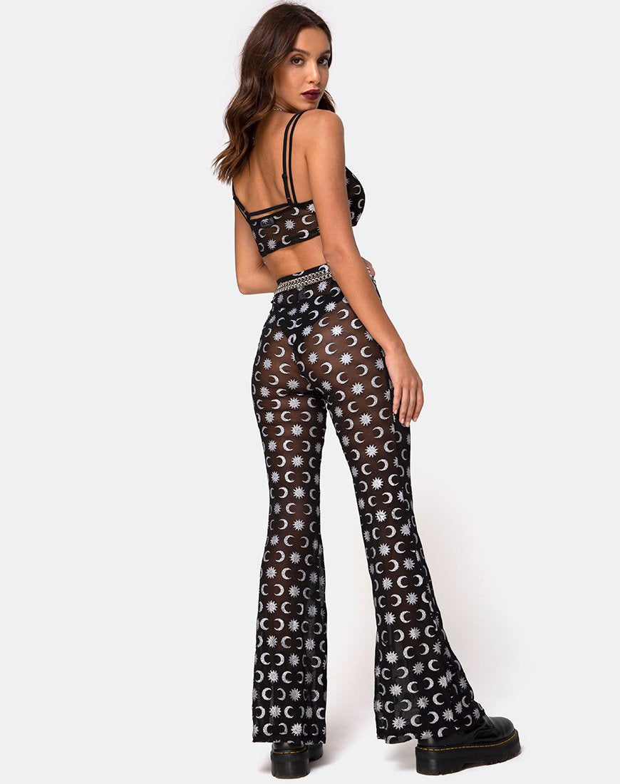 Immagine di Herlom: pantalone flare in nero over the moon con glitter