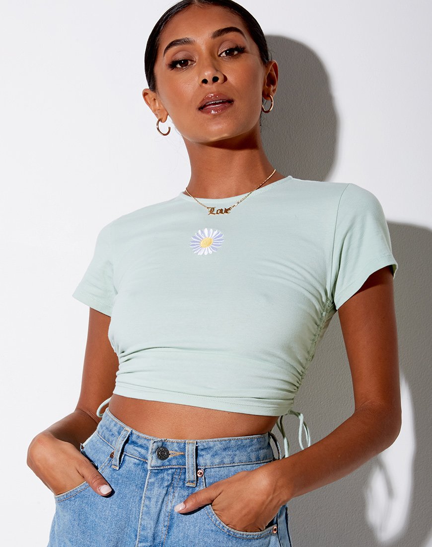 Doga Crop Top in morbido pistacchio con ricamo a margherita