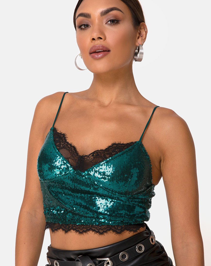 Top Drilly in mini paillettes verde acqua con pizzo nero