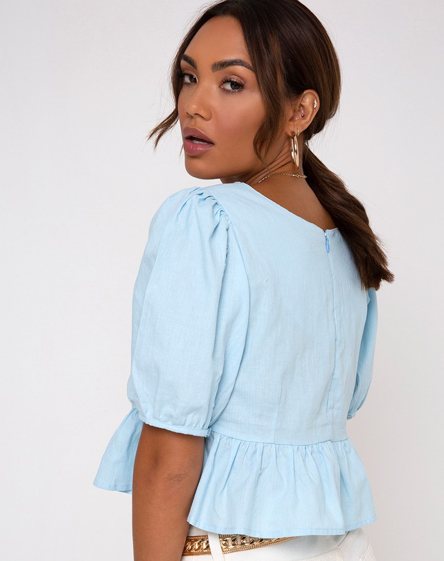 Top Ellen in blu cielo