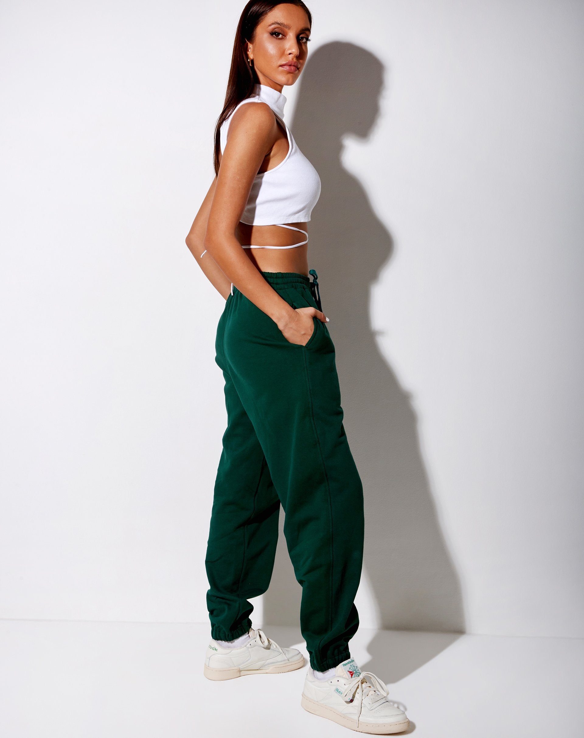 Immagine di Basta Jogger in verde bottiglia con ricamo Take Care Of Yourself