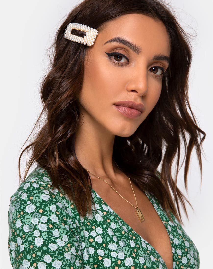 Immagine della clip per capelli in oro microperla