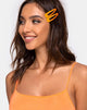 Immagine del set di fermagli per capelli al neon in arancione