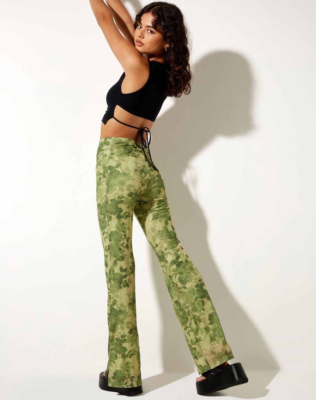 Heny - Pantalone svasato in fantasia floreale sfumata