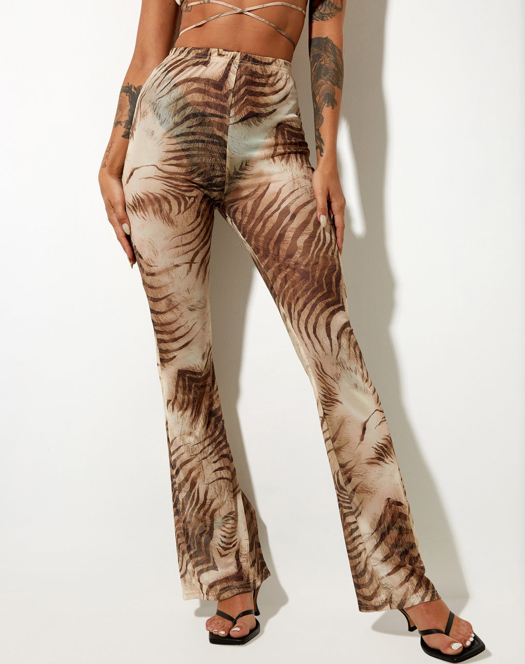 Pantaloni svasati Herlom in marrone tigrato