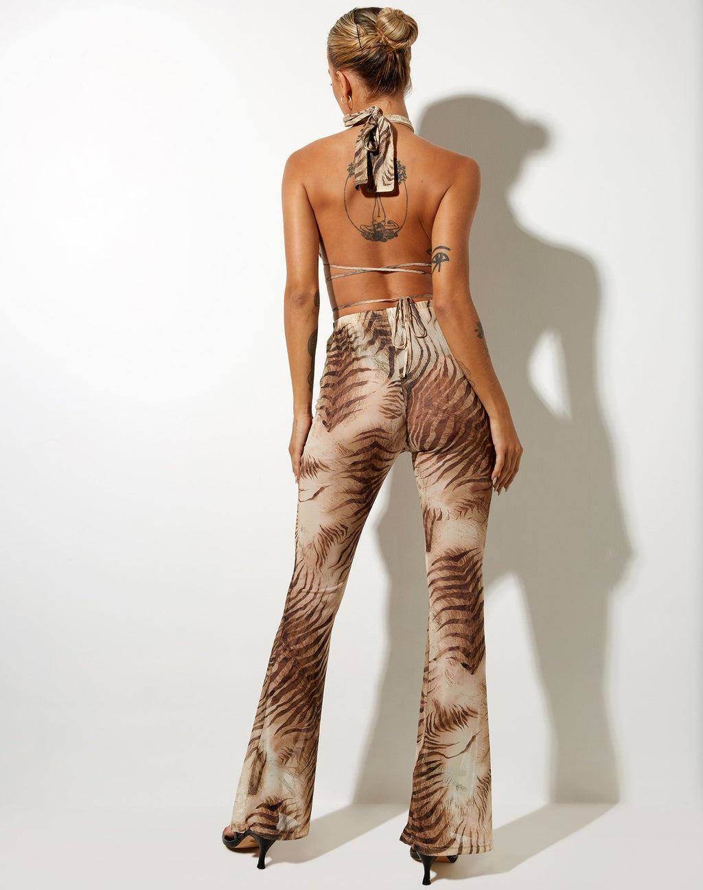 Pantaloni svasati Herlom in marrone tigrato