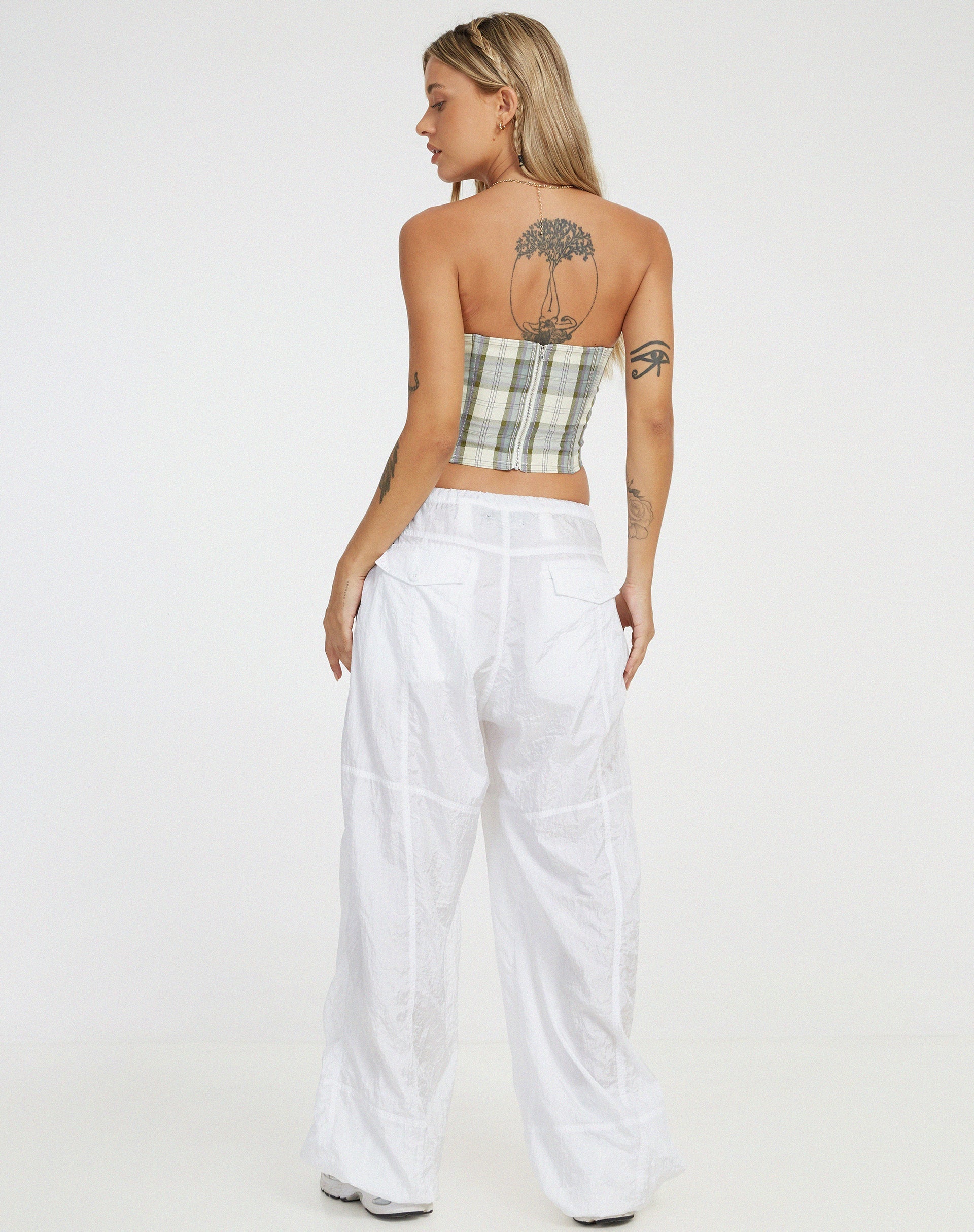 immagine del corsetto Kayashi in verde check e crema