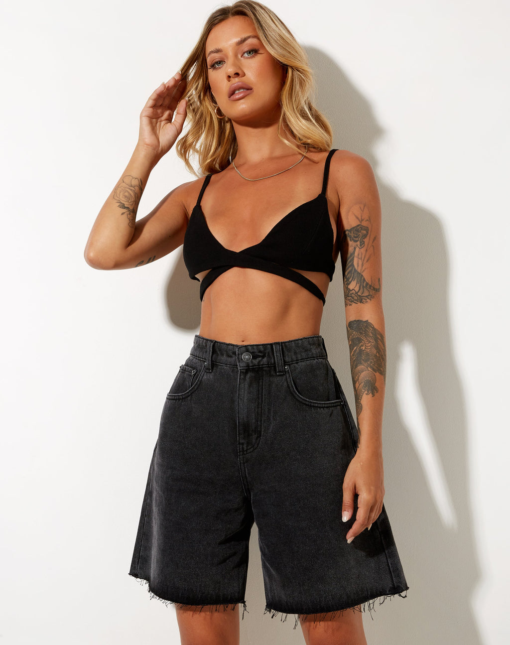 Pantaloncini di jeans loose fit con lavaggio nero