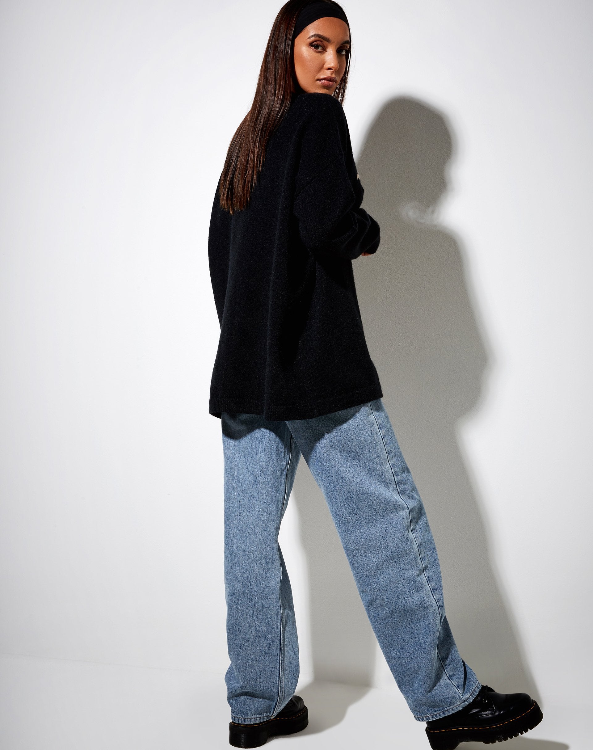 Immagine di Lulees Jumper in maglia nera con angelo in crema