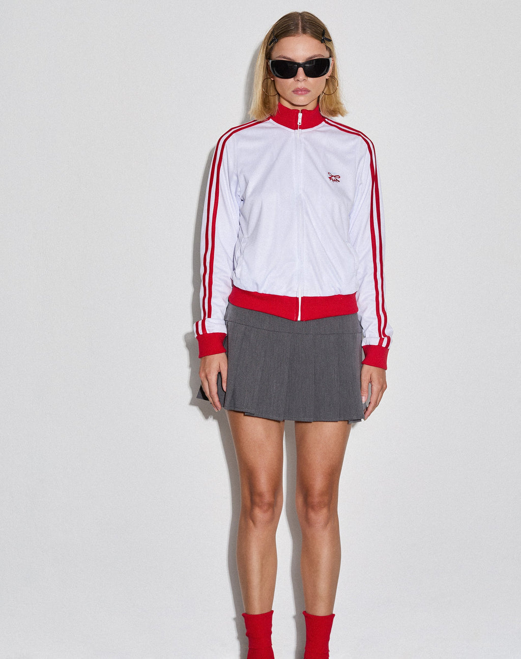 Giacca con zip Makira in bianco con doppia riga rossa