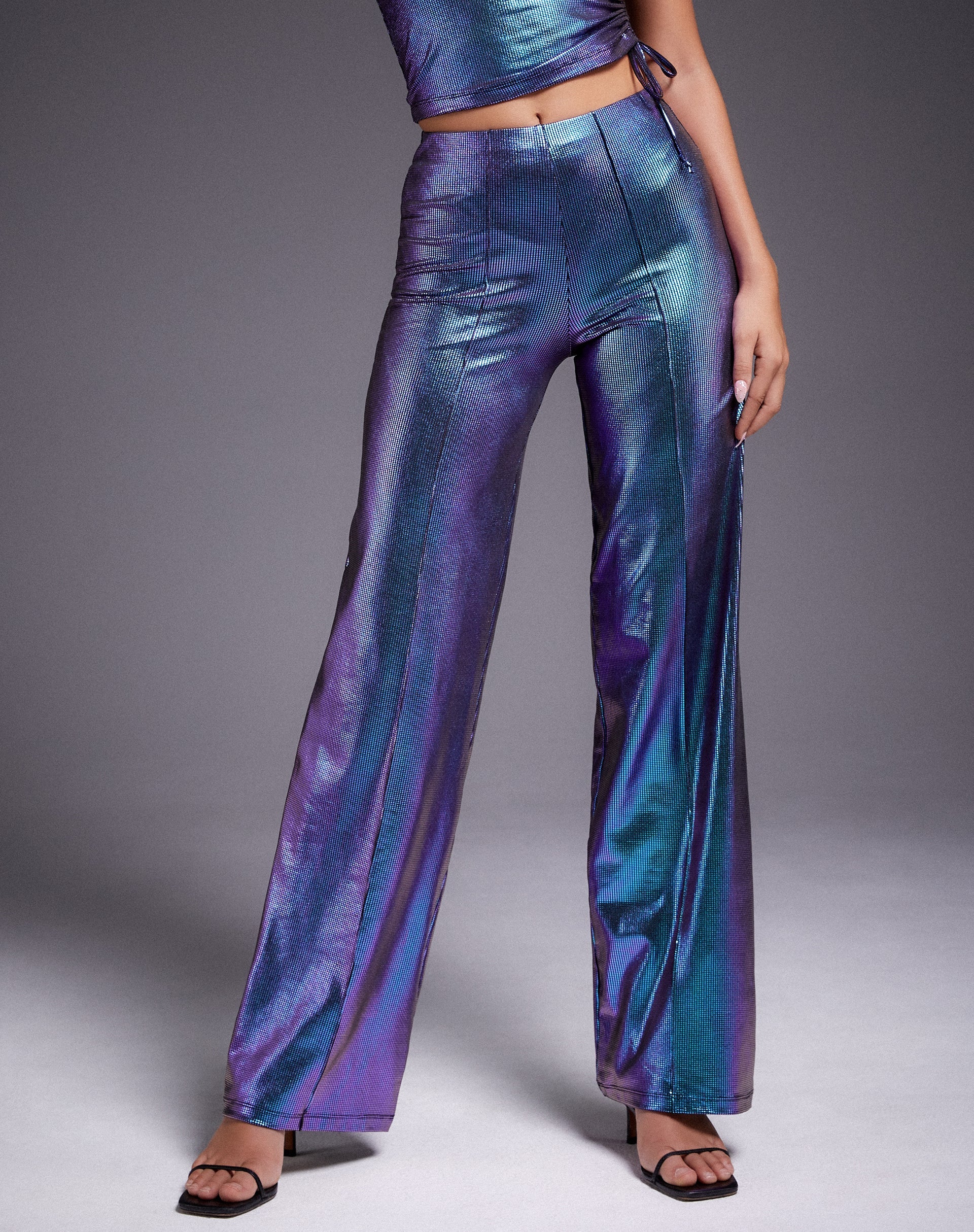 Immagine dei pantaloni Pista in viola olografico