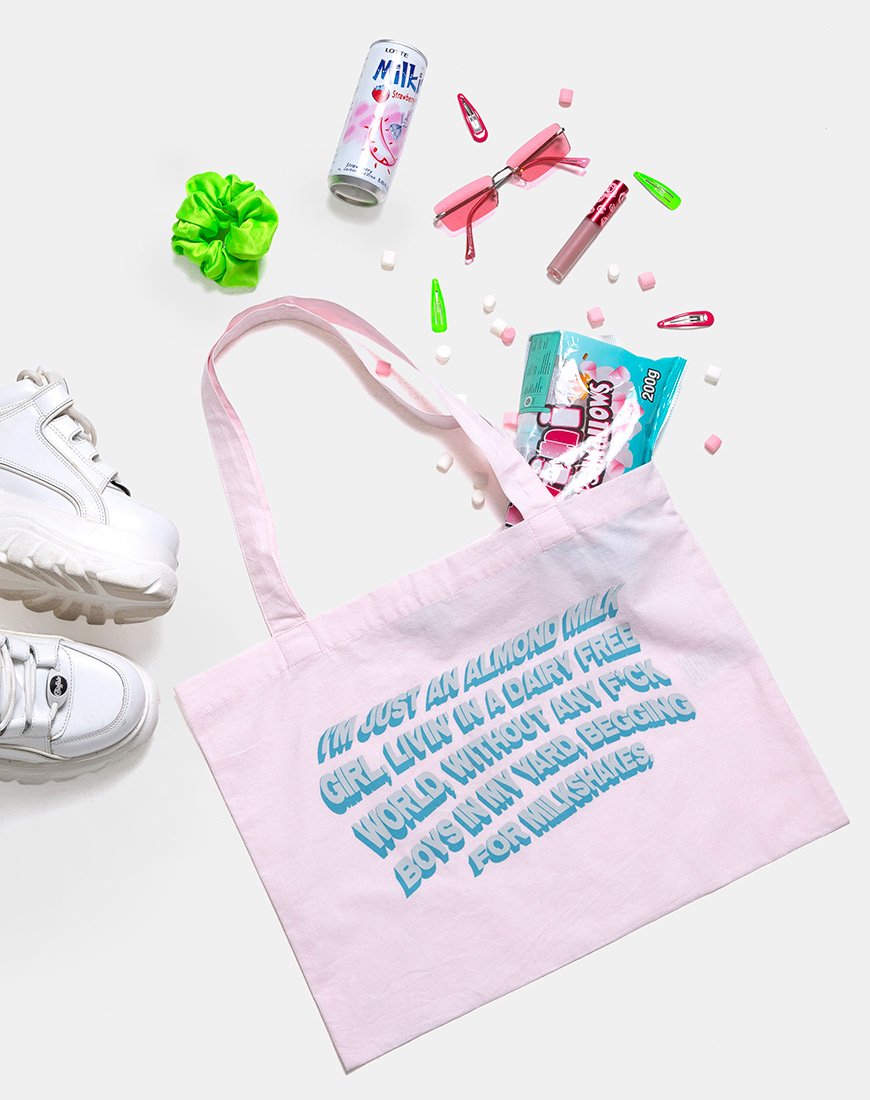 Immagine di Tote Bag in rosa tenue con testo X Top Girl in latte di mandorla