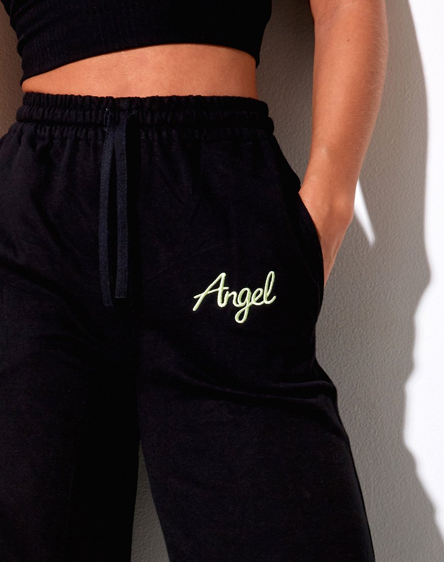 Jogger Nattan in nero con ricamo 'Angel' in verde neon