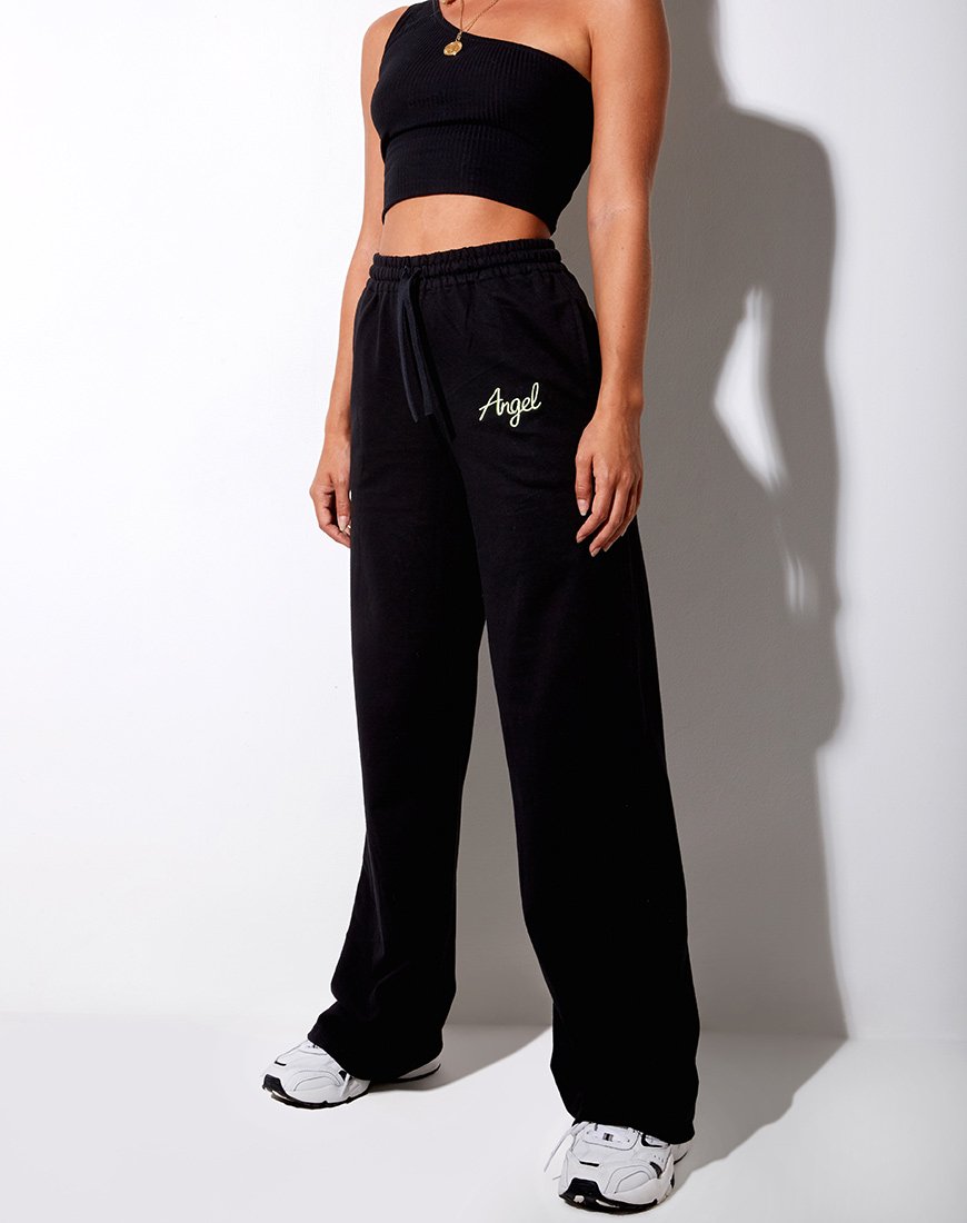 Jogger Nattan in nero con ricamo 'Angel' in verde neon