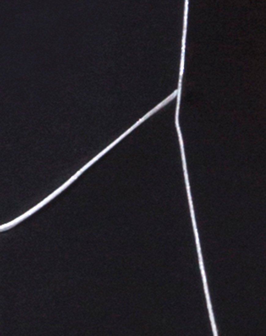 Immagine di Pion Tuta da bagno nera con linea di tubazioni