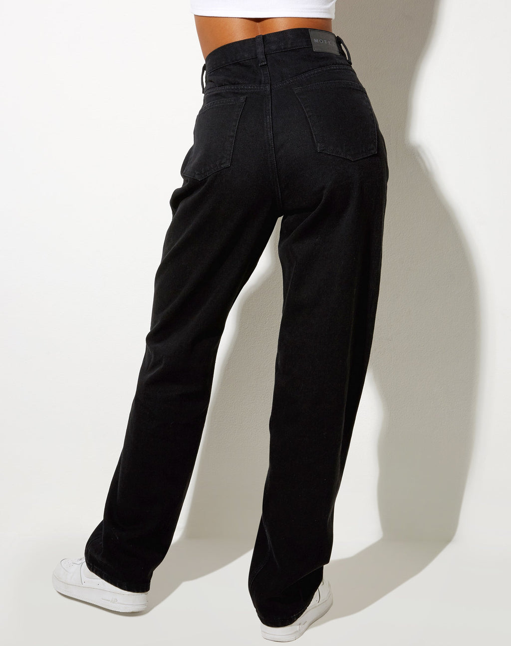 Jeans plissettati con lavaggio nero