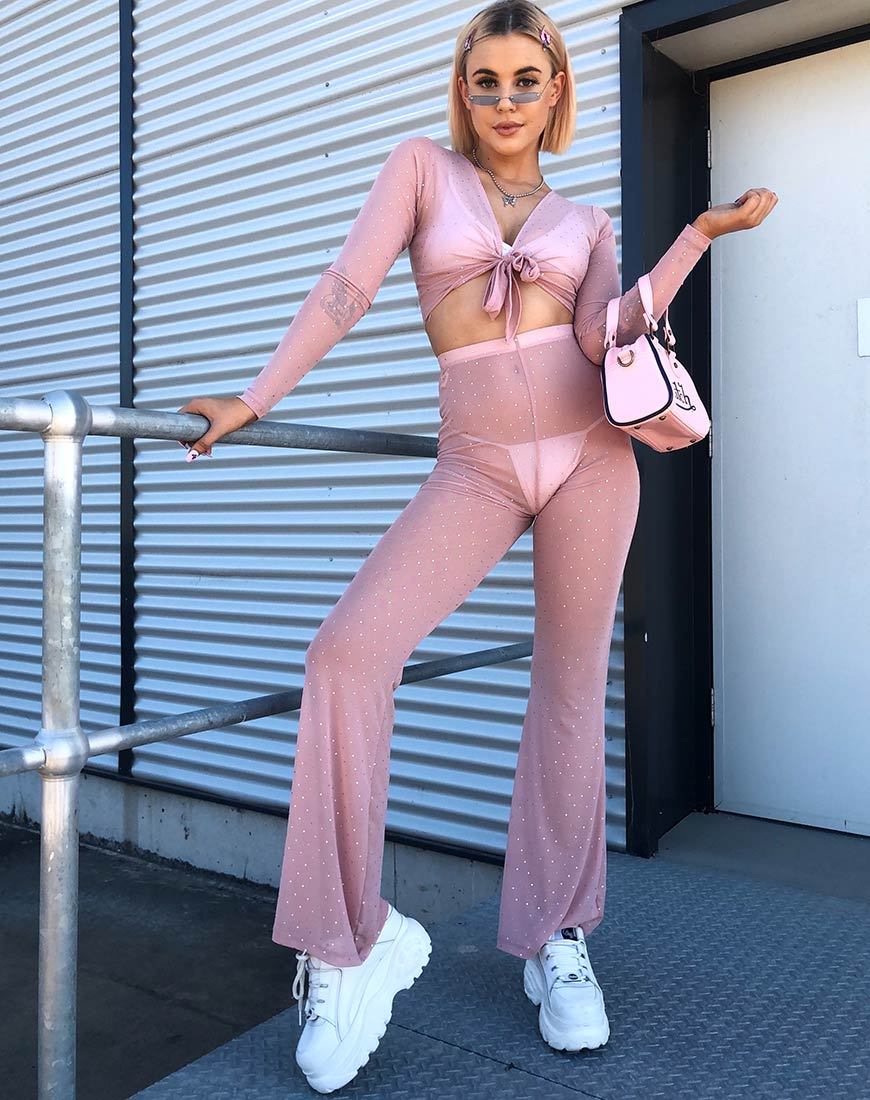 Pantaloni svasati Herlom in rete di cristallo rosa