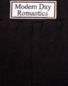 Etichetta nera con etichetta Modern Day Romantics Embro