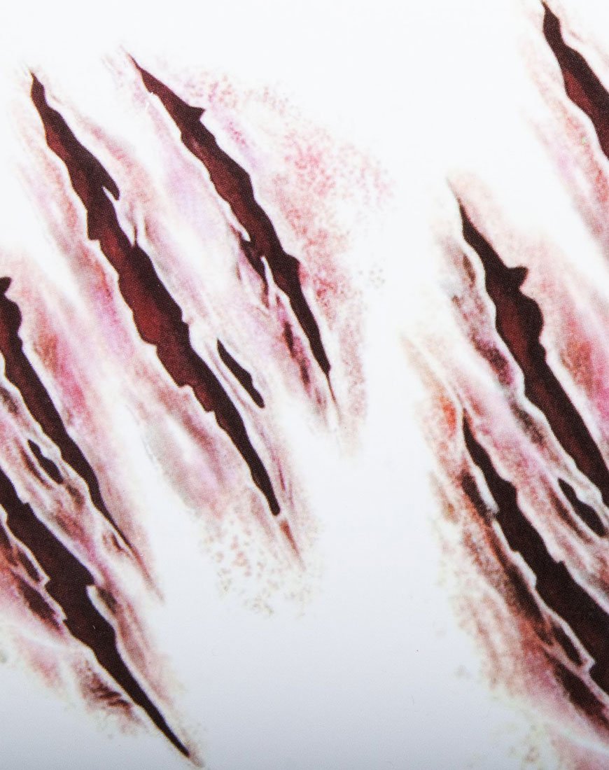 Immagine di Skin Rip Transfer Tattoo by Shrine
