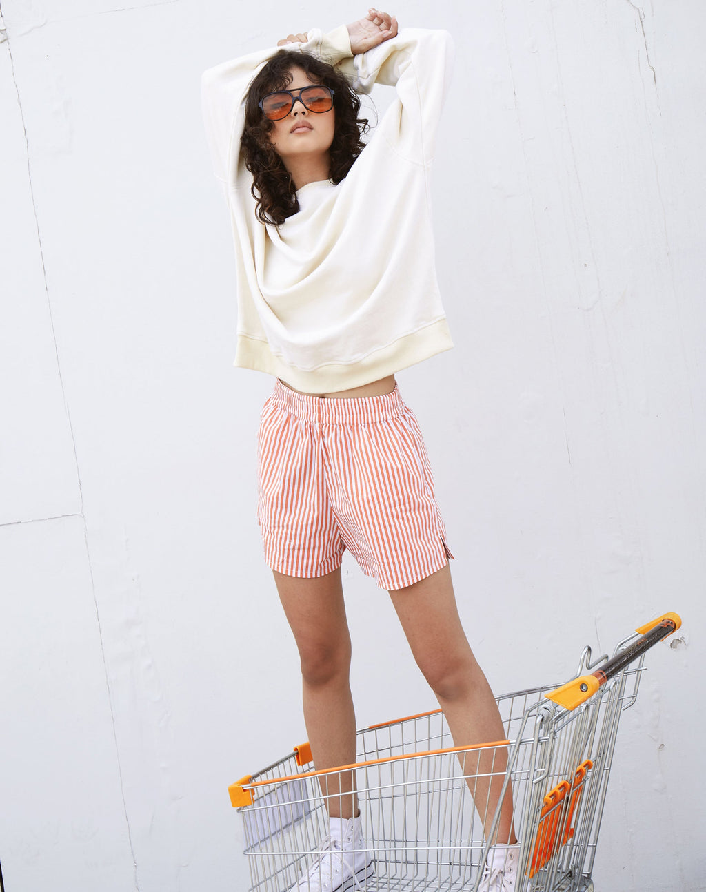 Pantaloncini Lala a righe verticali arancioni