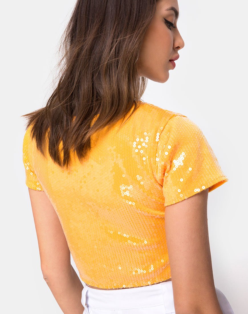 Crop Top Tindy in tangerino con paillettes trasparenti