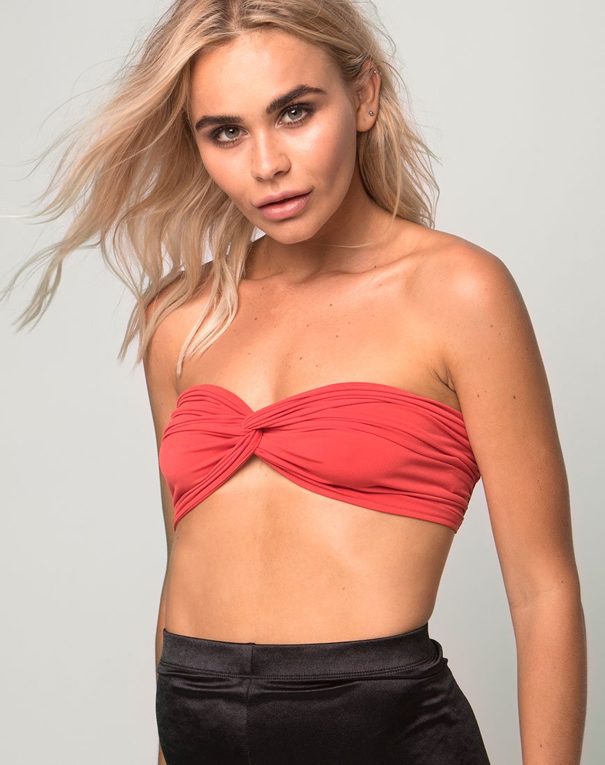 Top a fascia ritorto in arancione bruciato