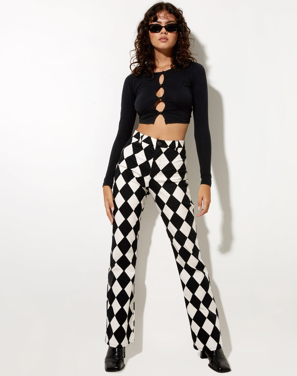 Pantaloni svasati Zoven in arlecchino bianco e nero